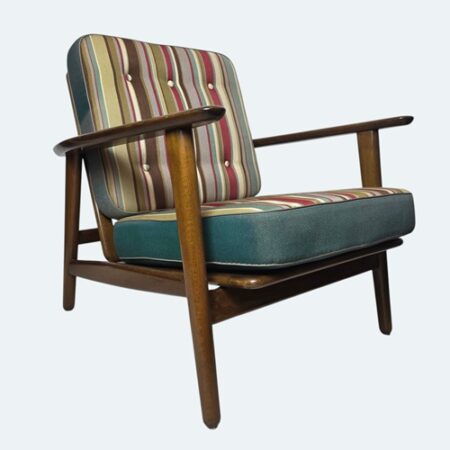Hans Wegner GE233 Danish Modern chair featuring original striped box cushions and solid timber frame