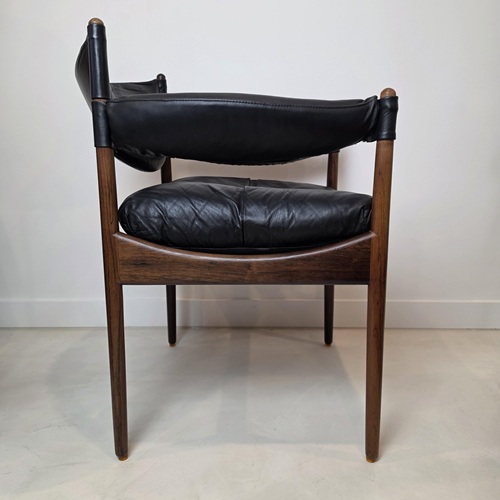 Danish mid‑century rosewood chair and matching footstool designed by Kristian Vedel