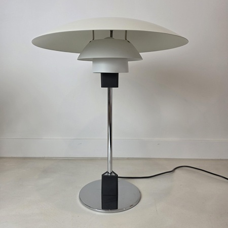 Poul Henningsen PH 4/3 table lamp for Louis Poulsen, Danish modern lighting icon with white metal shades and timeless Scandinavian design