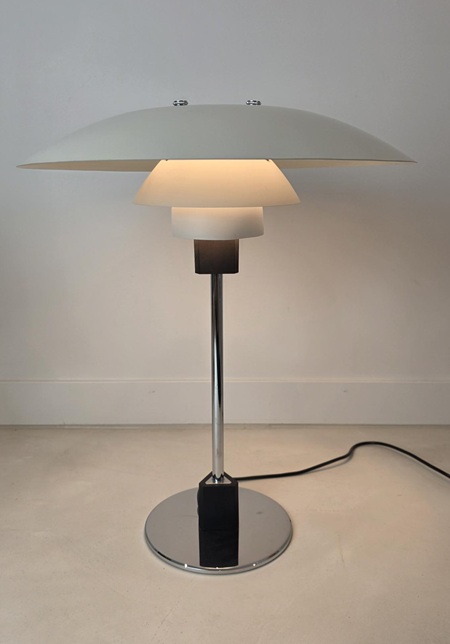 Poul Henningsen PH 4/3 table lamp for Louis Poulsen, Danish modern lighting icon with white metal shades and timeless Scandinavian design