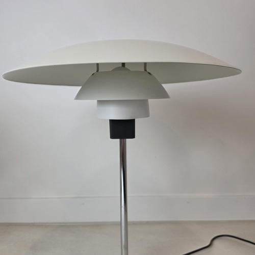 Detail of PH 4/3 table lamp by Poul Henningsen showing the layered three-shade system designed to provide soft glare-free light
