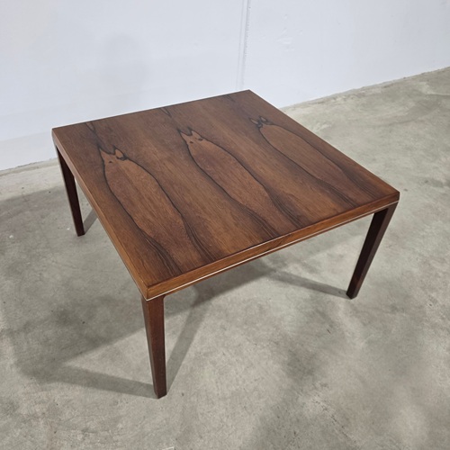 A square Danish mid-century rosewood coffee table with amazing wood grain structure