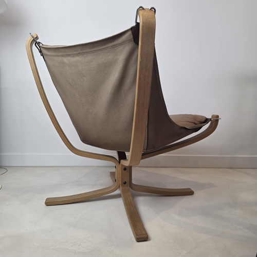Rear view of vintage Falcon chair by Sigurd Ressel with canvas sling and beech frame.